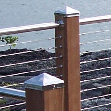 stainless steel pyramid post caps on coastal redwood deck